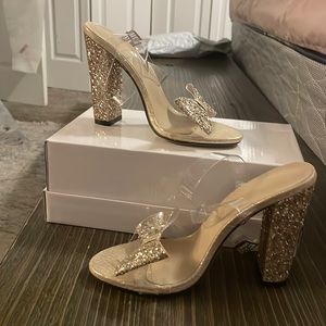 Gold heels with bow clear straps